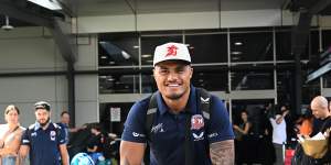 Roosters prop Spencer Leniu put on a brave face as he returned to Sydney on Tuesday.