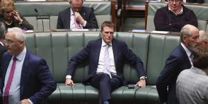 Industry Minister Christian Porter withdrew his defamation action against the ABC on Monday,with the parties settling out of court. 