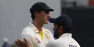 Pat Cummins with India counterpart Rohit Sharma.
