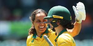 Chloe Tryon and Laura Wolvaardt of South Africa celebrate after the win.