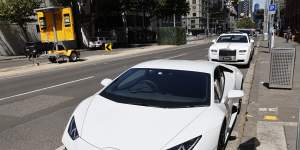 A Lamborghini and Rolls-Royce outside the Melbourne Assessment Prison as they waited for Majid Alibadi to leave on bail.