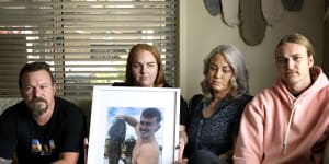 The Chater family – Ralph,Shayne,Stacey and Harry – with a photo of son and brother Brayden. 