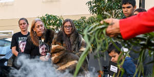 Donna Nelson,wrapped in possum fur,last year outside the inquest into her daughter’s death.