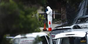 Forensic police investigate the shooting of a man in his 20s in Belmore.