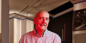 Professor Rob Freestone,the guest curator of a new exhibition at the Museum of Sydney,stands in front of a model of a proposal that would have razed all of the Rocks. It didn’t go ahead because the company that won the tender couldn’t afford to buy all the properties needed for redevelopment.