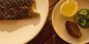 Crisp-skinned Manjimup rainbow trout with salted cucumber,crème fraiche and caramelised shallot.