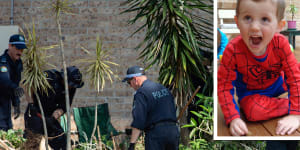 NSW Police search the gardens below a balcony at the home from which William Tyrrell disappeared.