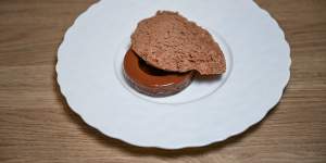 The Valrhona chocolate,sesame and whisky dessert is topped with aerated chocolate ice-cream.
