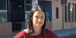 Alison Murphy,owner of Central Hotel,stands on the empty streets of Lakes Entrance.