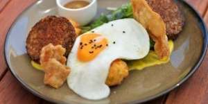 Spice-crusted white pudding with sweetcorn fritters.