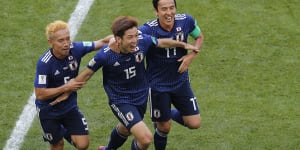 Japan sink 10-man Colombia in historic win for Asia