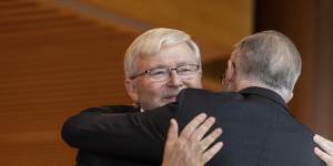 Former Prime Minister Kevin Rudd is embraced by Prime Minister Anthony Albanese during the unveiling of his official portrait last year.
