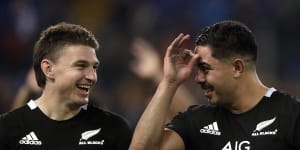 One-sided:New Zealand's Beauden Barrett (left) and Anton Lienert-Brown celebrate after the thrashing of Italy.