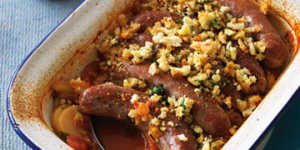 Baked sausages with herby breadcrumbs.