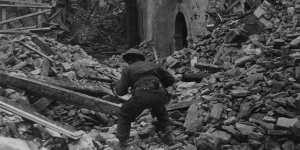 A soldier searches through the rubble at Cassino in 1944.