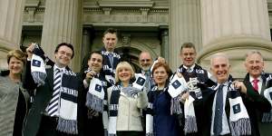 Martin Pakula (third from left),a Blues’ tragic,with fellow parliamentarians (L-R) Donna Petrovich,Michael O’Brien,Justin Madden,Jan Kronberg,Peter Crisp,Jeanette Powell,Peter Hall,Martin Dixon and Ken Smith on the steps of Parliament in 2007. 