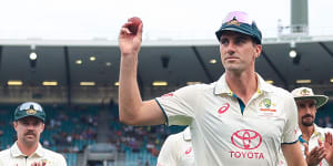 Pat Cummins leaves the field after taking his fifth wicket at the SCG on Wednesday.