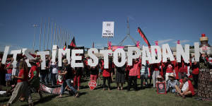 Adani protestors on the front lawn of Parliament House in Canberra in February this year.