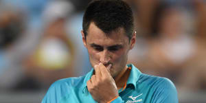 Tomic falls to Cilic despite late fightback