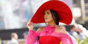 Pretty in red-pink:Olympia Bellchambers at Caulfield Cup on October 15,2022.