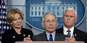 Anthony Fauci,director of the National Institute of Allergy and Infectious Diseases,centre,addresses the media alongside Vice-President Mike Pence,right,and Deborah Birx,coronavirus response coordinator,on Monday.
