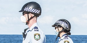Police patrol Bondi Beach to enforce COVID-19 restrictions in August last year.