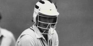 John Dyson wearing an early model helmet during a Sheffield Shield match in 1980.