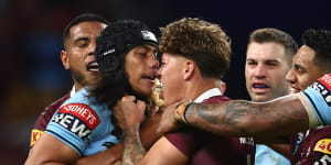 Jarome Luai and Reece Walsh lock horns during Origin two this year.