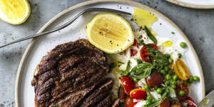 Seared scotch fillet with mozzarella,peas and cherry tomatoes.