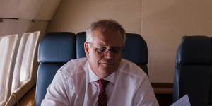 Australian Prime Minister Scott Morrison onbaord a RAAF Boeing 737 BBJ flying from Sydney to Brisbane,for a number of community engagements and policy announcements. 
