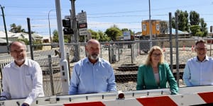 Transport Minister Rita Saffioti (centre) with Energy Minister Bill Johnston (left) and south east Labor MPs Hugh Jones,Chris Tallentire,Stephen Price and Matthew Swinbourne at the Mint Street level crossing.