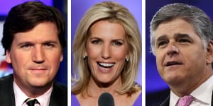 Fox News hosts Tucker Carlson,Laura Ingraham and Sean Hannity.