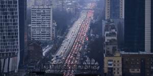Cars stream out of Kyiv on February 24,following missile strikes by Russian forces on Ukrainian territory.