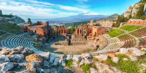 The amazing Greek theatre in Taormina offers views out to Mount Etna.