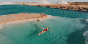 Swim in salt lakes at Siwa Oasis.