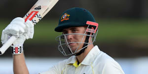 Giant strides:Green stars for Australia after stormy start to day two in Galle