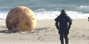 ‘Godzilla Egg’:Giant mysterious metal orb washes ashore in Japan