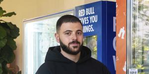 Cake Mail founder Jonathan Mussaad at his new Chatswood vending machine.