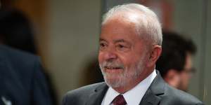 Brazilian President-elect Luiz Inácio Lula Da Silva smiles after a meeting on with at the electoral commission as part of the official presidential transition authorised by President Jair Bolsonaro after the election results were announced.