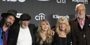Christine McVie (second from right) with Fleetwood Mac,from left,Mike Campbell,John McVie,Stevie Nicks,and Mick Fleetwood in 2019.