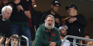 Russell Crowe watching the Rabbitohs play against and Roosters in 2021.