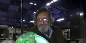 Ross Pogson,from the Australian Museum,holds its Fluorite crystal sample,which is sometimes mistaken for Kryptonite.