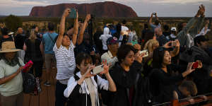 'It's a tidal wave':Tourists flock to Uluru as ban on climbing approaches