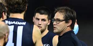 Blues coach David Teague talks to his players during Saturday night’s clash.