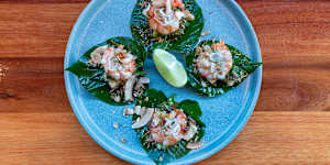 Miang kham with a spicy mix of prawns,jicama,coconut and peanuts.