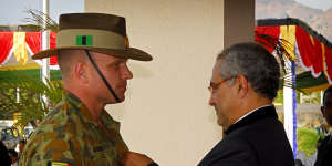 Dan Gosling receiving the Timorese Medal of Merit for service in supporting the development of the Timorese Defence Force from then president Jose Ramos Horta in 2009.