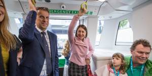 Transport Minister Andrew Constance and Premier Gladys Berejiklian ride the first regular metro service on Sunday.
