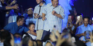 Presidential candidate Prabowo Subianto (right) and his running mate Gibran Rakabuming Raka during a gathering with supporters on Wednesday.