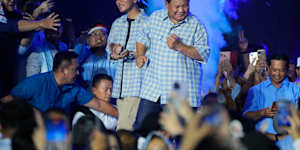 Indonesia’s Prabowo Subianto (right) and his running mate,Gibran Rakabuming Raka,(Joko Widodo’s son) at a post-election party. TikTok helped the strongman dance his way to the presidential palace.
