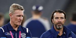 Geelong coach Chris Scott (right) and football boss Simon Lloyd have the challenge of fixing the Cats’ slow start.
